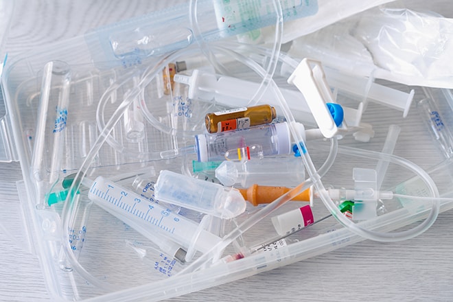 Medical Syringes And Ampoules Of Plastic And Glass That Were In Use, Waste, Close Up.