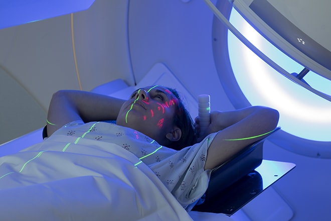 Woman Receiving Radiation Therapy/ Radiotherapy Treatments For C