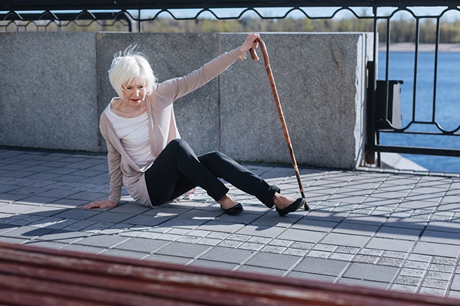 Grey Headed Woman Feeling Helplessness In The Street