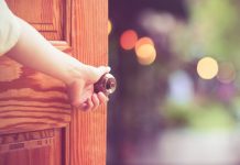 Women Hand Open Door Knob Or Opening The Door.