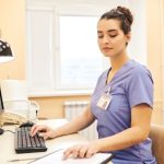 Medical specialist adding information about covid-19