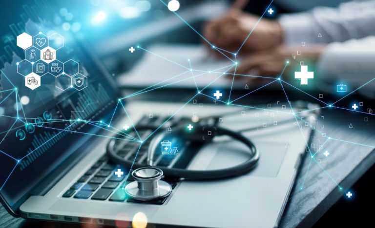 computer with stethoscope and digital visuals