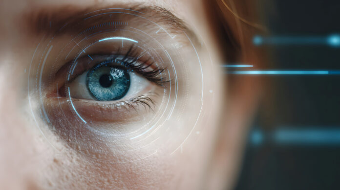 Close-up of a blue eye with digital interface elements around it, suggesting augmented reality or futuristic technology. oog